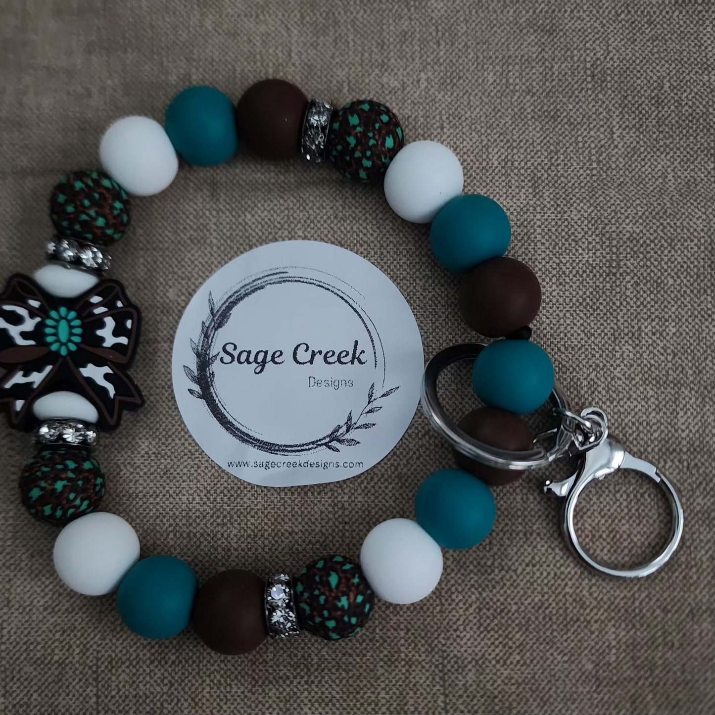 Brown/Teal Bow wristlet