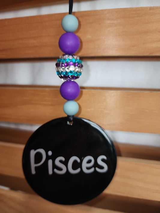 Astrological car charms