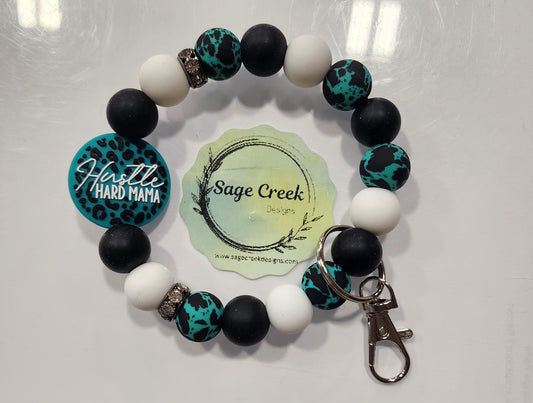 Hustle - Mom wristlet in teal