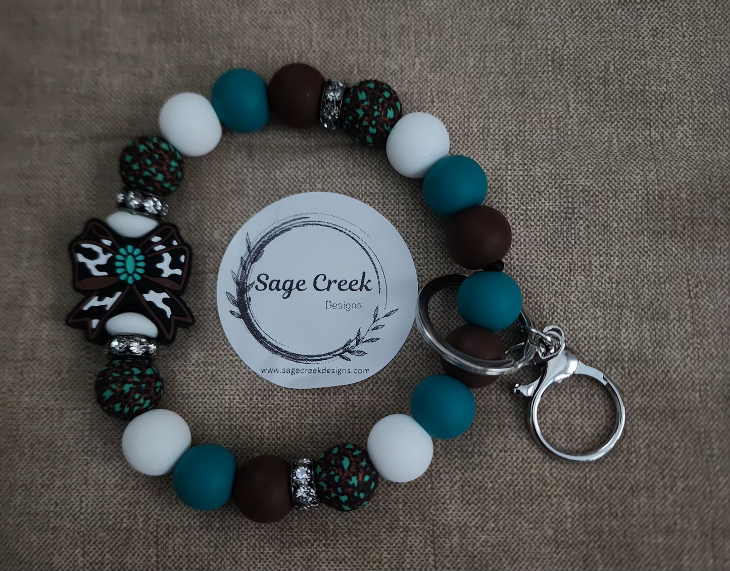 Brown/Teal Bow wristlet