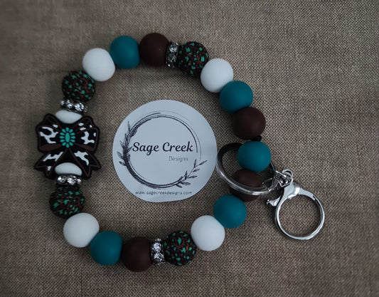 Brown/Teal Bow wristlet